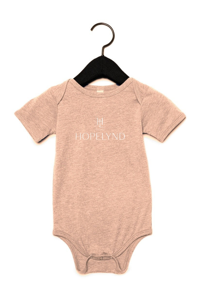 Peach Triblend Hopelynd Logo Infant One-Piece with white logo
